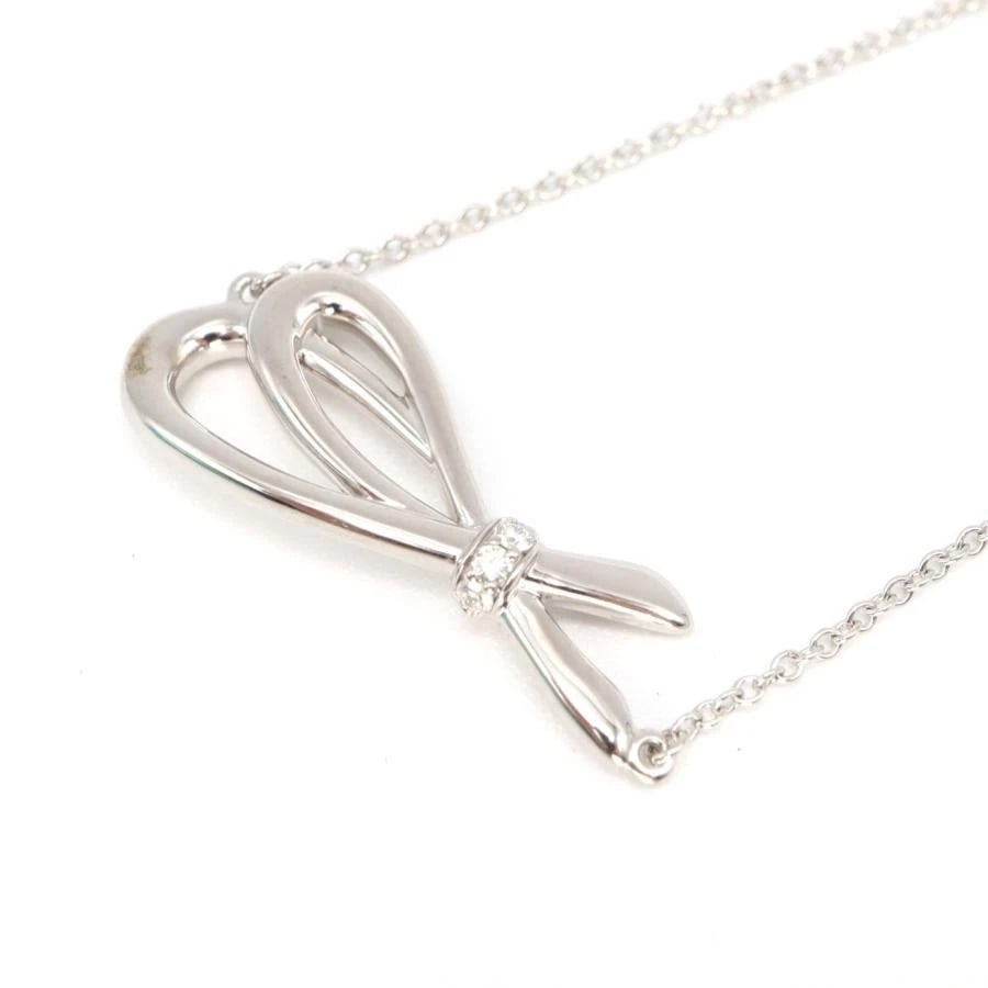 TIFFANY & CO. BOW K18 WHITE GOLD LADIES BRACELET: Tiffany & Co. Bow K18 White Gold Ladies Bracelet Brand: Tiffany & Co. Type/Style: Bracelet Material: Metal Purity K18, Metal White Gold, Main Stone/Creation Natural Color: White Gold Size: Bracele