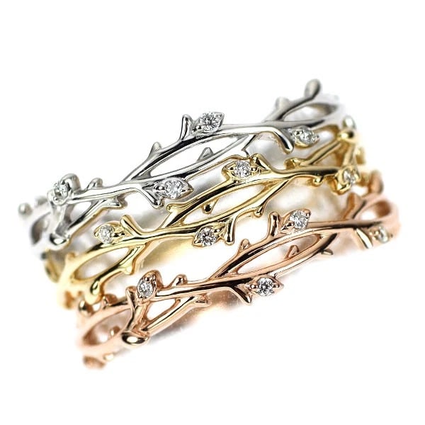 K10WG/YG/PG DIAMOND RING SET OF 3 PLANTS: K10WG/YG/PG Diamond Ring Set of 3 Plants Brand: None Type/Style: Ring Material: Metal Purity K18, Metal Gold, Main Stone/Creation Natural Color: None Size: 4.75 - 5 US Accessories: None