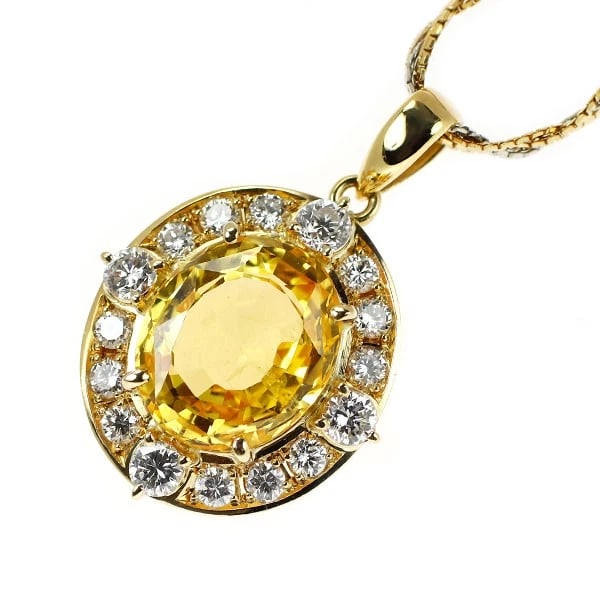 K18YG/PT850 YELLOW SAPPHIRE DIAMOND PENDANT NECKLACE: K18YG/PT850 Yellow Sapphire Diamond Pendant Necklace Brand: None Type/Style: Pendant Necklace Material: Metal Purity K18, Metal Gold, Main Stone/Creation sapphires Color: None Size: Necklace: