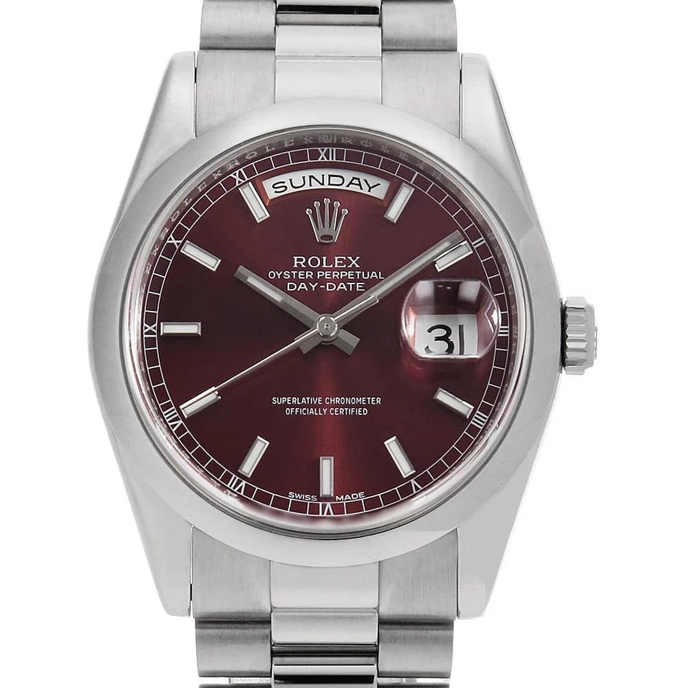 ROLEX DAY CHERRY WRIST WATCH: ROLEX Day Cherry Wrist Watch Brand: ROLEX Type: Wrist watch Material: Band Material Platinum, Case Material Platinum Color: Cherry Size: Case:W36mm Circumference of Wrist:18.5cm Accessories: None
