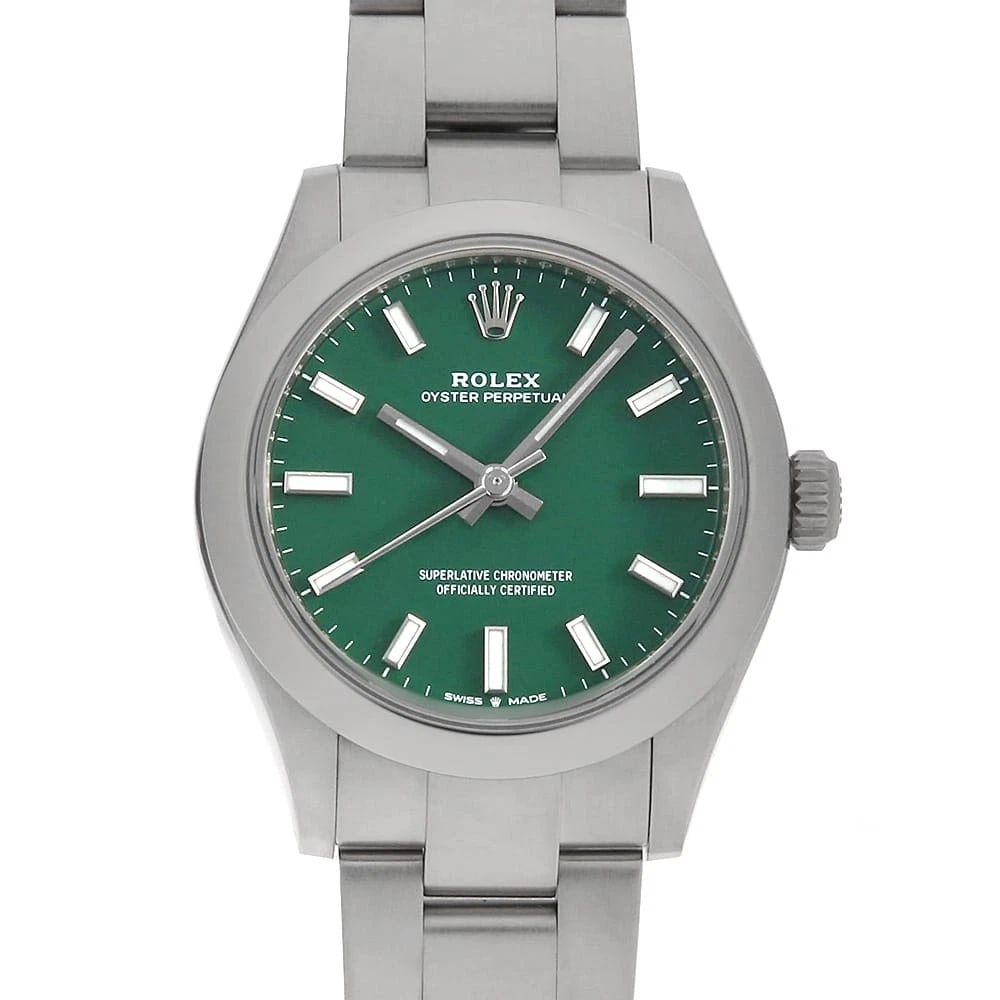 ROLEX OYSTER PERPETUAL GREEN WRIST WATCH: ROLEX Oyster Perpetual green Wrist Watch Brand: ROLEX Type: Wrist watch Material: Band Material Stainless Steel, Case Material Stainless Steel Color: Green Size: Case:W31mm Circumference of Wrist: