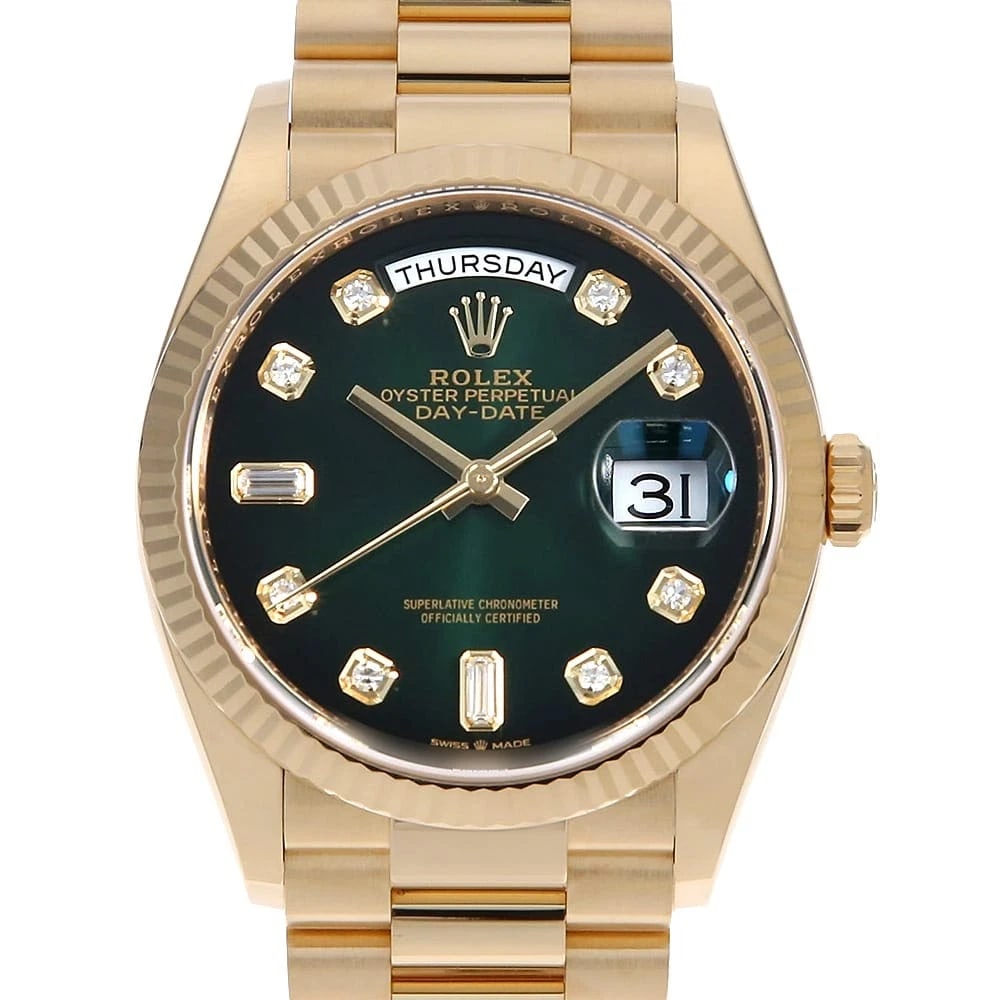ROLEX DAY DATE 36 8P ROUND 2P BAGUETTE DIAMOND WRIST WATCH: ROLEX Day Date 36 8P Round 2P Baguette Diamond Wrist Watch Brand: ROLEX Type: Wrist watch Material: Band Material Yellow Gold, Case Material Yellow Gold Color: Green Ombre Size: Case:W36mm Circumf