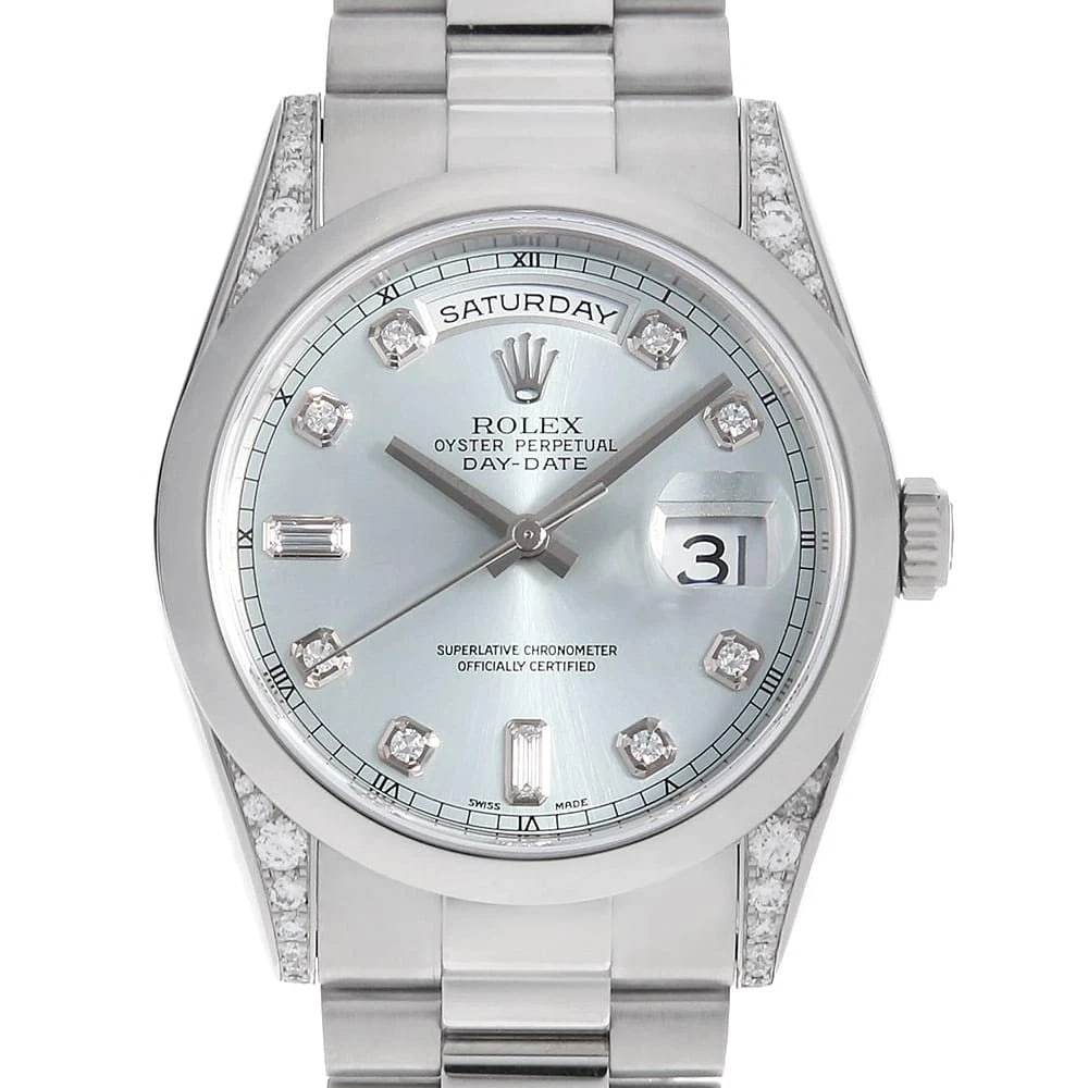 ROLEX DAY DATE LUG DIAMOND 8P DIAMOND/2P BUCKET WRIST WATCH: ROLEX Day Date Lug Diamond 8P Diamond/2P Bucket Wrist Watch Brand: ROLEX Type: Wrist watch Material: Band Material Platinum, Case Material Platinum Color: Ice Blue Size: Case:W36mm Circumference o