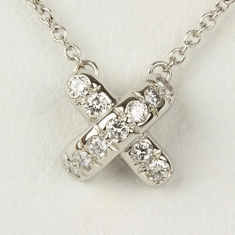 TIFFANY & CO. CROSS STITCH DIAMOND PLATINUM NECKLACE: Tiffany & Co. Cross Stitch Diamond Platinum Necklace Brand: Tiffany & Co. Type/Style: Necklace Material: Metal Purity Pt950, Metal Platinum, Main Stone/Creation Natural Color: Platinum Size: Chain