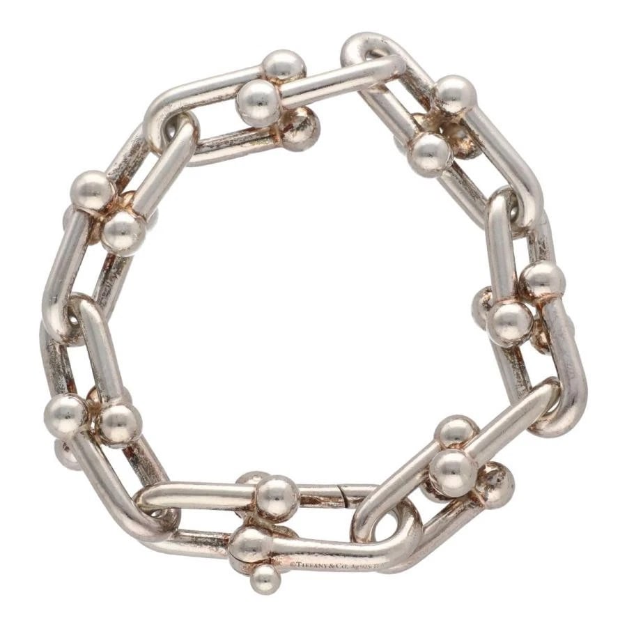 TIFFANY & CO. HARDWARE LINK 925 SILVER BRACELET: Tiffany & Co. Hardware Link 925 Silver Bracelet Brand: Tiffany & Co. Type/Style: Bracelet Material: Metal Purity 925, Metal Silver, Color: Silver Size: Small, inner circumference 5.75 inches