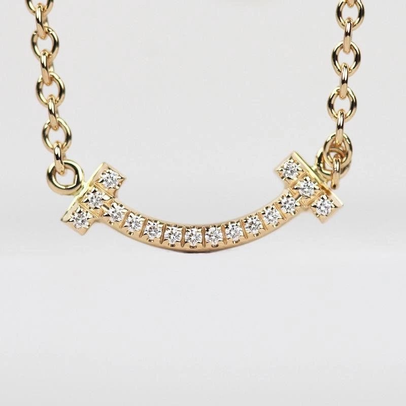 TIFFANY & CO. T SMILE K18PG DIAMOND BRACELET: Tiffany & Co. T Smile K18PG Diamond Bracelet Brand: Tiffany & Co. Type/Style: Bracelet Material: Metal Purity K18, Metal Pink Gold, Main Stone/Creation Natural Color: Pink Gold Size: Total