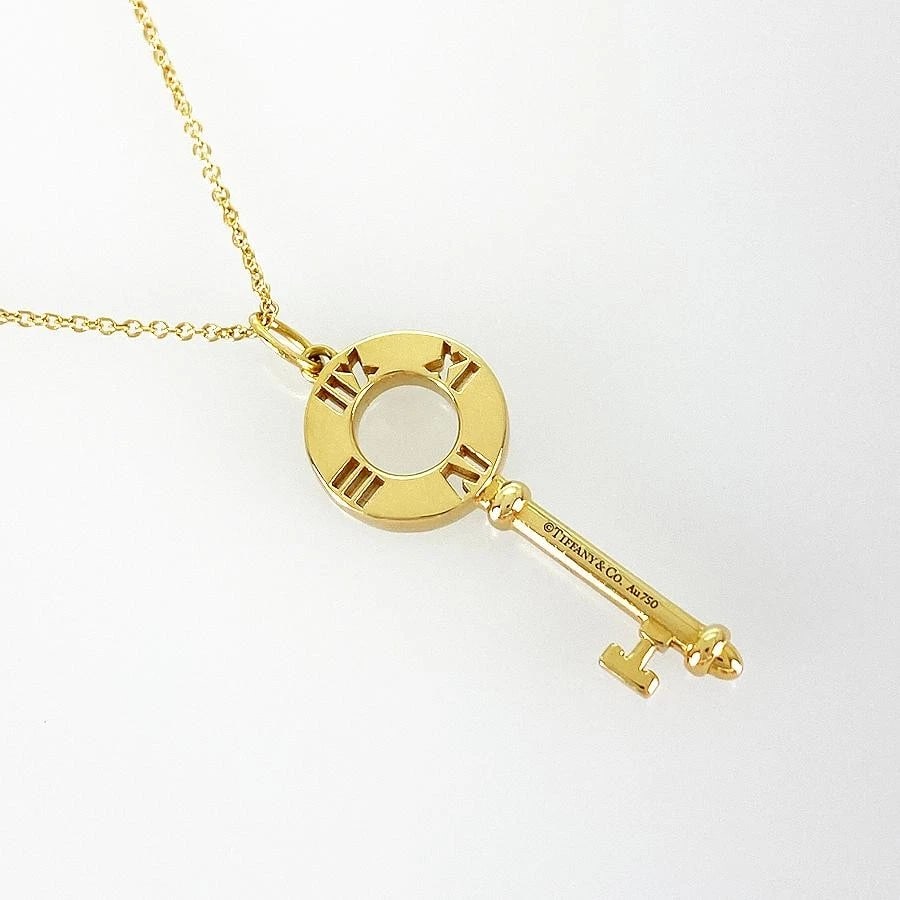 TIFFANY & CO. ATLAS KEY DIAMOND K18YG LENGTH NECKLACE: Tiffany & Co. Atlas Key Diamond K18YG Length Necklace Brand: Tiffany & Co. Type/Style: Necklace Material: Metal Purity K18, Metal Yellow Gold, Main Stone/Creation Natural Color: Yellow Gold Size: