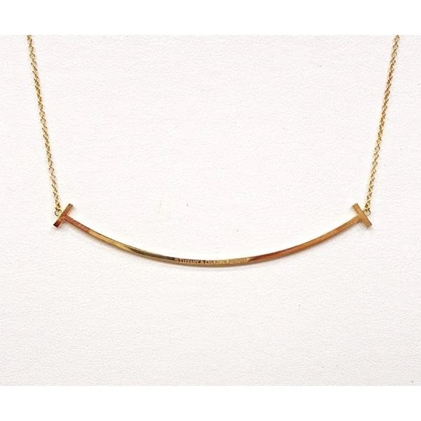 TIFFANY & CO. T SMILE LARGE DIAMOND K18 NECKLACE: Tiffany & Co. T Smile Large Diamond K18 Necklace Brand: Tiffany & Co. Type/Style: Necklace Material: Metal Purity K18, Metal Gold, Color: Gold Size: Necklace: Approx. W: 6.8cm x H: 1.3cm,??????Nec