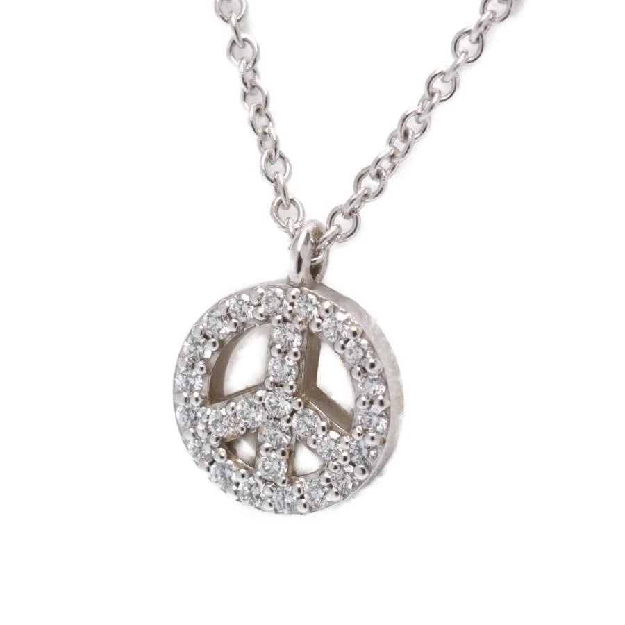 TIFFANY & CO. METRO PEACE K18WG DIAMOND NECKLACE: Tiffany & Co. Metro Peace K18WG Diamond Necklace Brand: Tiffany & Co. Type/Style: Necklace Material: Metal Purity K18, Metal White Gold, Main Stone/Creation Natural Color: White Gold Size: Length: