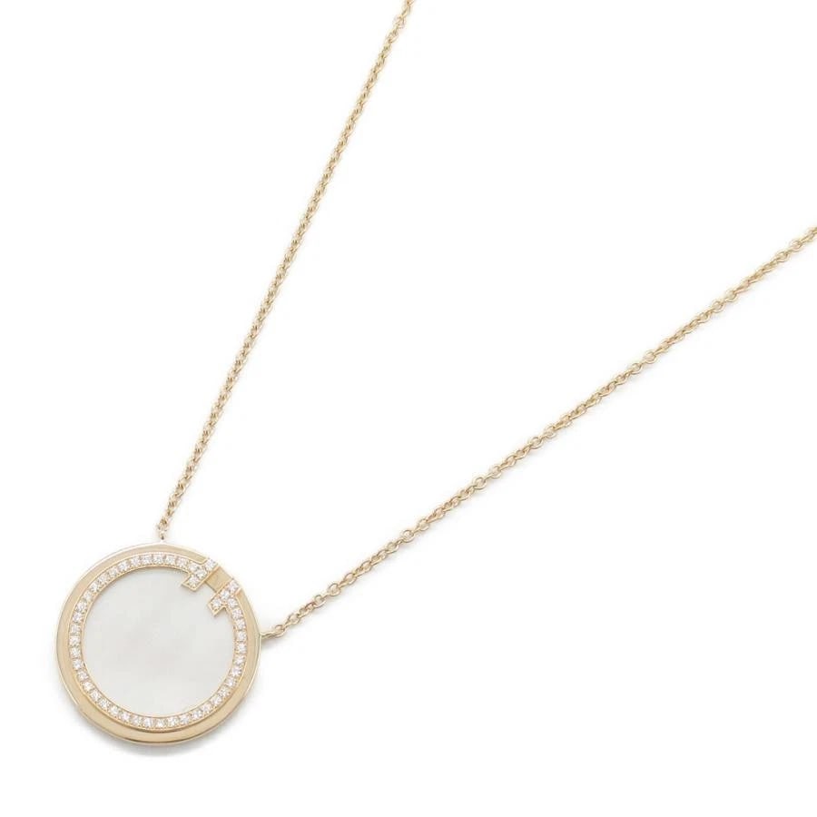 TIFFANY & CO. T CIRCLE SHELL DIAMOND 750PG NECKLACE: Tiffany & Co. T Circle Shell Diamond 750PG Necklace Brand: Tiffany & Co. Type/Style: Necklace Material: Metal Purity 750, Metal Pink Gold, Main Stone/Creation Natural Color: Pink Gold Size: Neck c