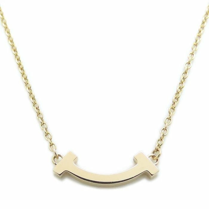 TIFFANY T SMILE NECKLACE MINI 750PG PINK GOLD: TIFFANY T Smile Necklace Mini 750PG Pink Gold Brand: TIFFANY & Co. Type/Style: Necklace Material: Metal Purity Au750, Metal K18 Rose Gold, Main Stone/Creation Natural Color: K18 Rose Gold Size: 40