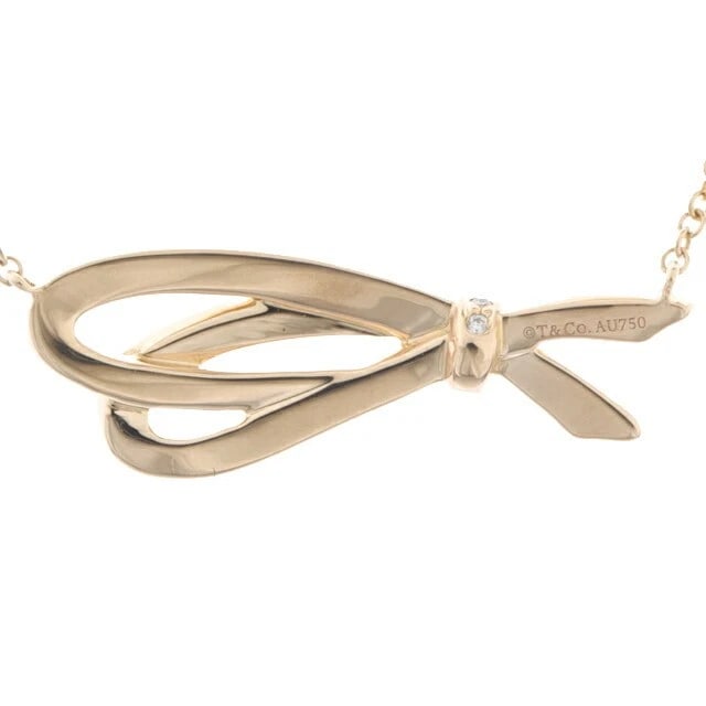 TIFFANY & CO. BOW DIAMOND NECKLACE LARGE RIBBON PENDANT: Tiffany & Co. Bow Diamond Necklace Large Ribbon Pendant Brand: Tiffany & Co. Type/Style: Necklace Material: Metal Purity Au750, Metal K18 PG Pink Gold, Color: Pink Gold Size: Top: Width approx. 2.