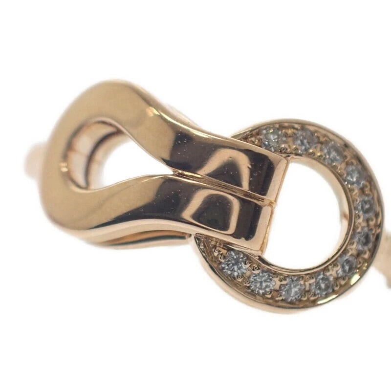 CARTIER AGRAFFE HALF DIAMOND K18PG RING: Cartier Agraffe Half Diamond K18PG Ring Brand: Cartier Type/Style: Ring Material: Metal Purity K18, Metal Pink Gold, Main Stone/Creation Natural Color: Pink Gold Size: US 4.5 Accessories: None