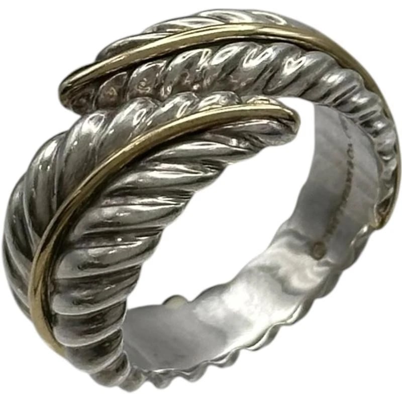 TIFFANY & CO. FEATHER MOTIF SILVER GOLD RING: Tiffany & Co. Feather Motif Silver Gold Ring Brand: Tiffany & Co. Type/Style: Ring Material: Metal Purity 925/K18, Metal Silver / Gold, Main Stone/Creation Natural Color: Silver / Gold Size: US 6