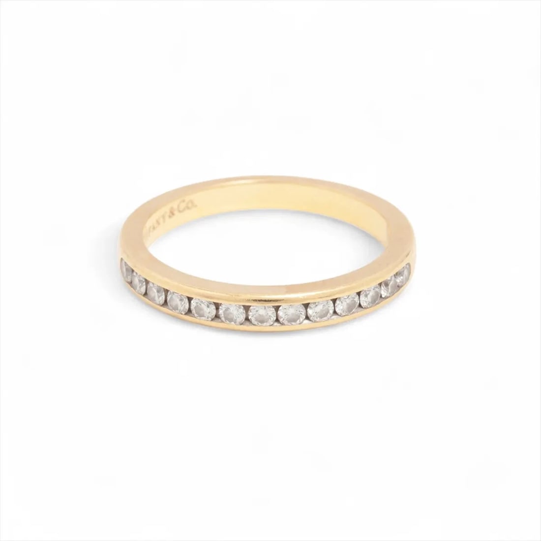 TIFFANY HALF CIRCLE CHANNEL SETTING DIAMOND RING: Tiffany Half Circle Channel Setting diamond Ring Brand: Tiffany Type/Style: Ring Material: 750(YG), Main Stone/Creation Natural Color: YG Size: 4.5 US Accessories: None Accessories Notice: