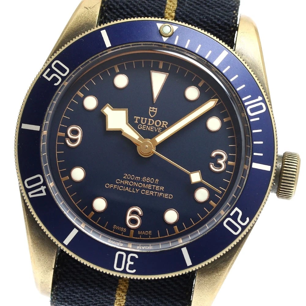 TUDOR HERITAGE BLACK BAY BRONZE BUCHERER: TUDOR Heritage Black Bay Bronze Bucherer Brand: TUDOR Type: Wristwatch Material: Band Material Nylon, Case Material bronze Color: Band Color Navy, Dial Color Navy, Case Color bronze Size: Case siz