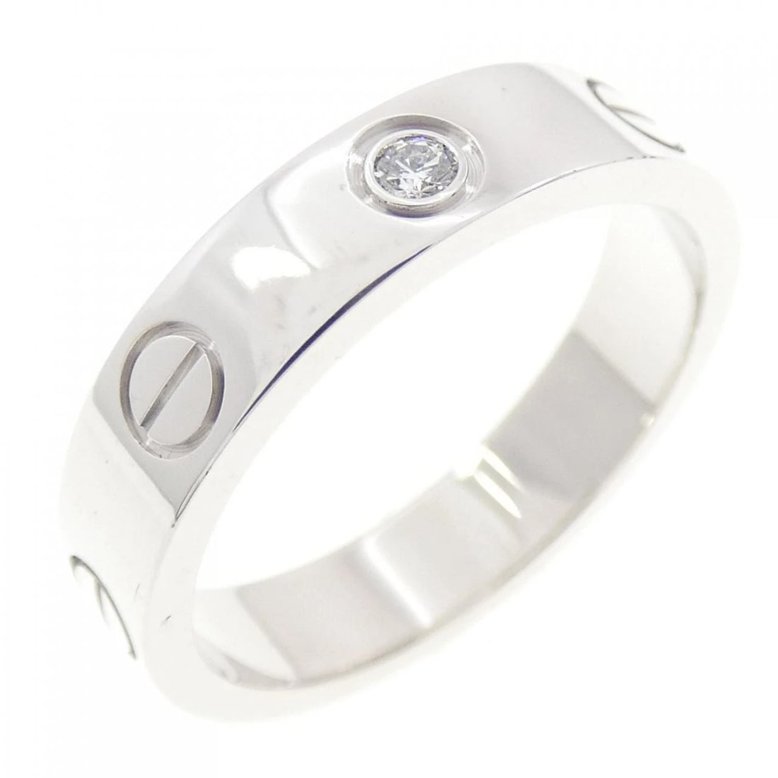 CARTIER MINI LOVE 1P RING: Cartier MINI LOVE 1P Ring Brand: Cartier Type: Ring Material: 750 White Gold, Main Stone/Creation Natural Color: White Size: 5 (US size) Accessories: None Accessories Notice: When purchasing