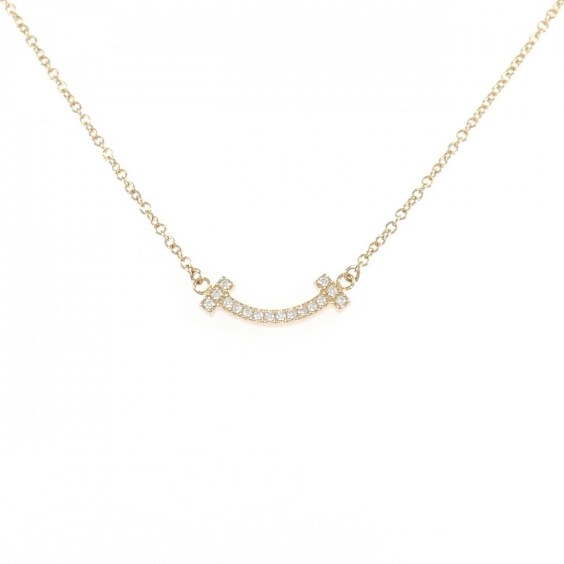 TIFFANY T SMILE MINI NECKLACE: Tiffany T Smile mini Necklace Brand: Tiffany Type: Necklace Material: 750 Pink Gold, Main Stone/Creation Natural Color: Pink Gold Size: ActualSize Pendant top H x W: 3.7mmx14.4mm Chain Max. W: