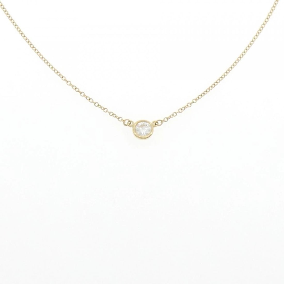 TIFFANY & CO. BY THE YARD NECKLACE: Tiffany & Co. By the Yard Necklace Brand: Tiffany Type: Necklace Material: 750 Yellow Gold, Main Stone/Creation Natural Color: Yellow Gold Size: ActualSize Pendant top H x W: 4.9mmx7.2mm Chain