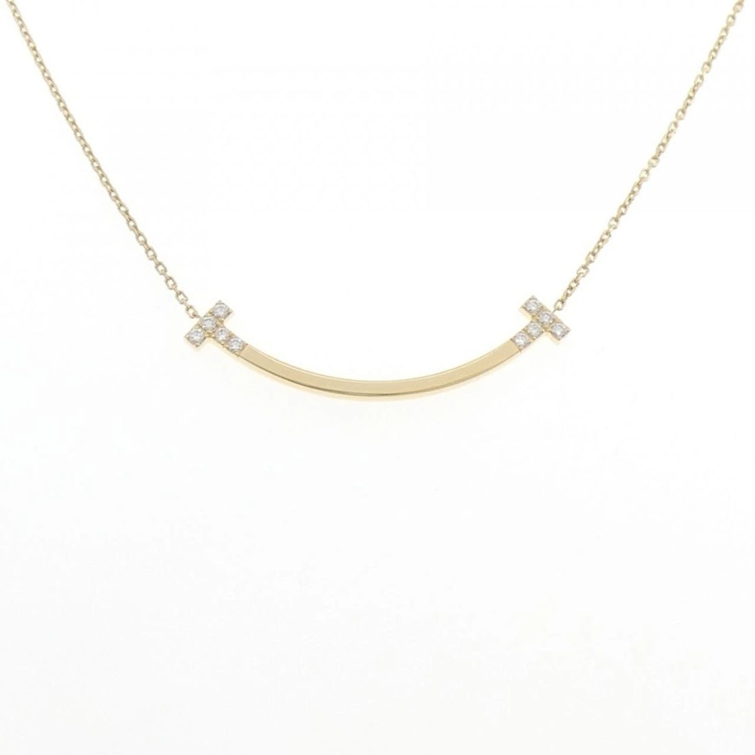 TIFFANY & CO. T SMILE MEDIUM NECKLACE: TIFFANY & Co. T Smile Medium Necklace Brand: TIFFANY&Co. Type: Necklace Material: 18K, Main Stone/Creation Natural Color: Gold Size: Actual Size Pendant length approx. x width approx.: