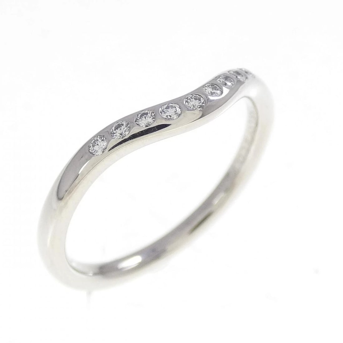 TIFFANY CURVED 9P RING: Tiffany Curved 9P Ring Brand: Tiffany Type: Ring Material: Platinum 950, Main Stone/Creation Natural Color: White Size: 4.5-5 (US size) Accessories: None Accessories Notice: When purchasing