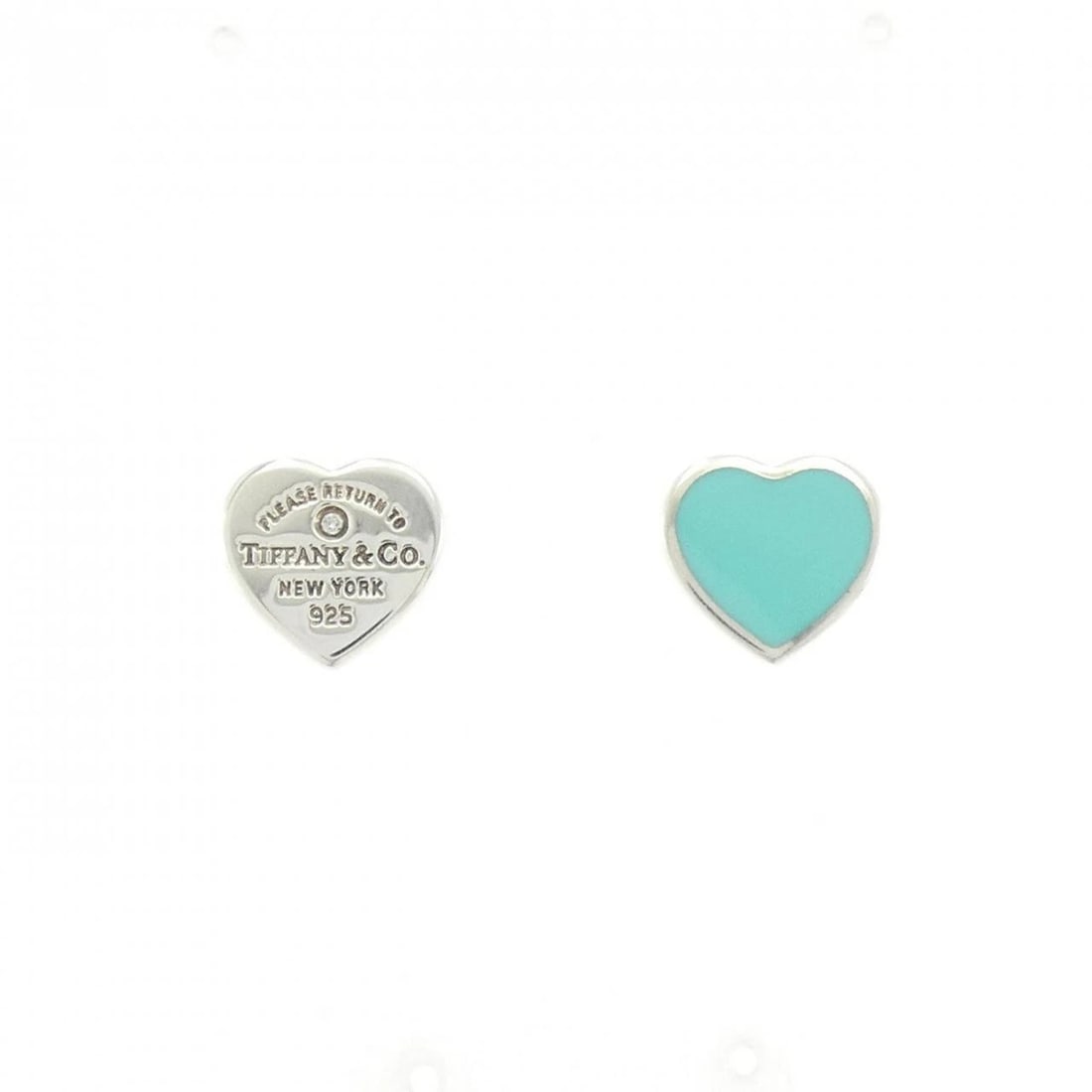 TIFFANY RETURN TO TIFFANY EARRINGS: Tiffany Return to Tiffany Earrings Brand: Tiffany Type: Earrings Material: 925 Silver, Main Stone/Creation Resin Color: Silver Size: ActualSize HxW: 9.4mmx10.0mm Accessories: None Accessories