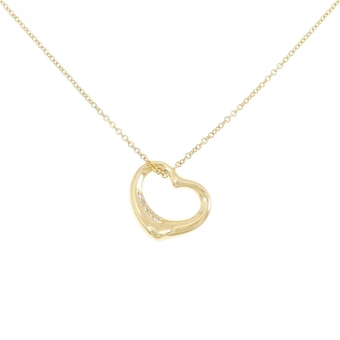 TIFFANY & CO. OPEN HEART NECKLACE: Tiffany & Co. Open Heart Necklace Brand: Tiffany Type: Necklace Material: 750 Yellow Gold, Main Stone/Creation Natural Color: Yellow Gold Size: ActualSize Pendant top H x W: 14.5mmx14.5mm