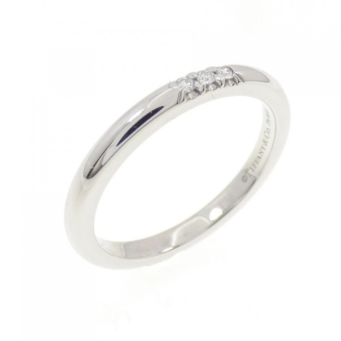 TIFFANY & CO. BAND RING: Tiffany & Co. band Ring Brand: Tiffany Type: Ring Material: Platinum 950, Main Stone/Creation Natural Color: White Size: 5 (US size) Accessories: None Accessories Notice: When purchasing