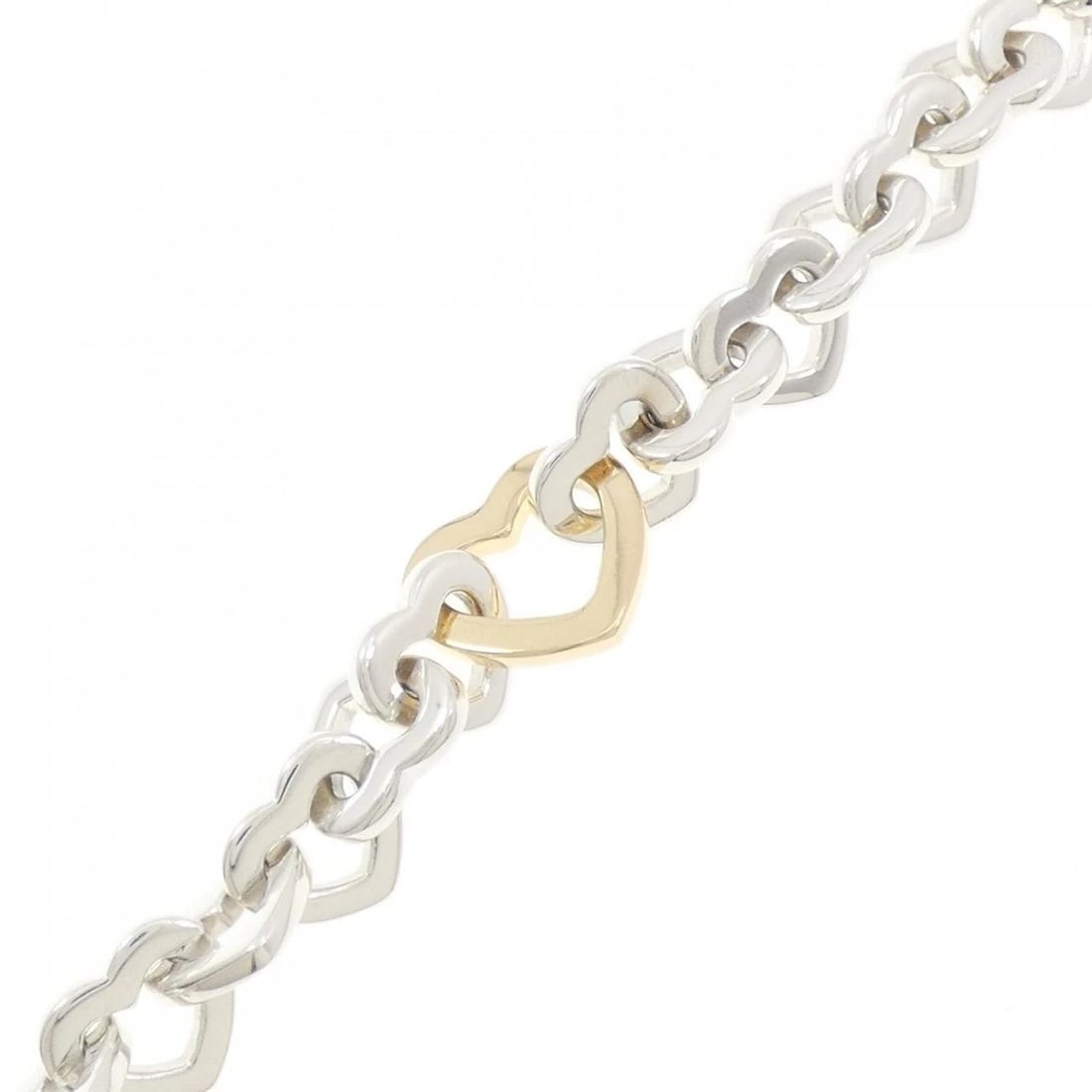 TIFFANY HEART LINK BRACELET: Tiffany Heart Link Bracelet Brand: Tiffany Type: Bracelet Material: 925 Silver 750 Yellow Gold, Color: Silver Yellow Gold Size: ActualSize Max W: 13.9mm Accessories: None Accessories Notice: