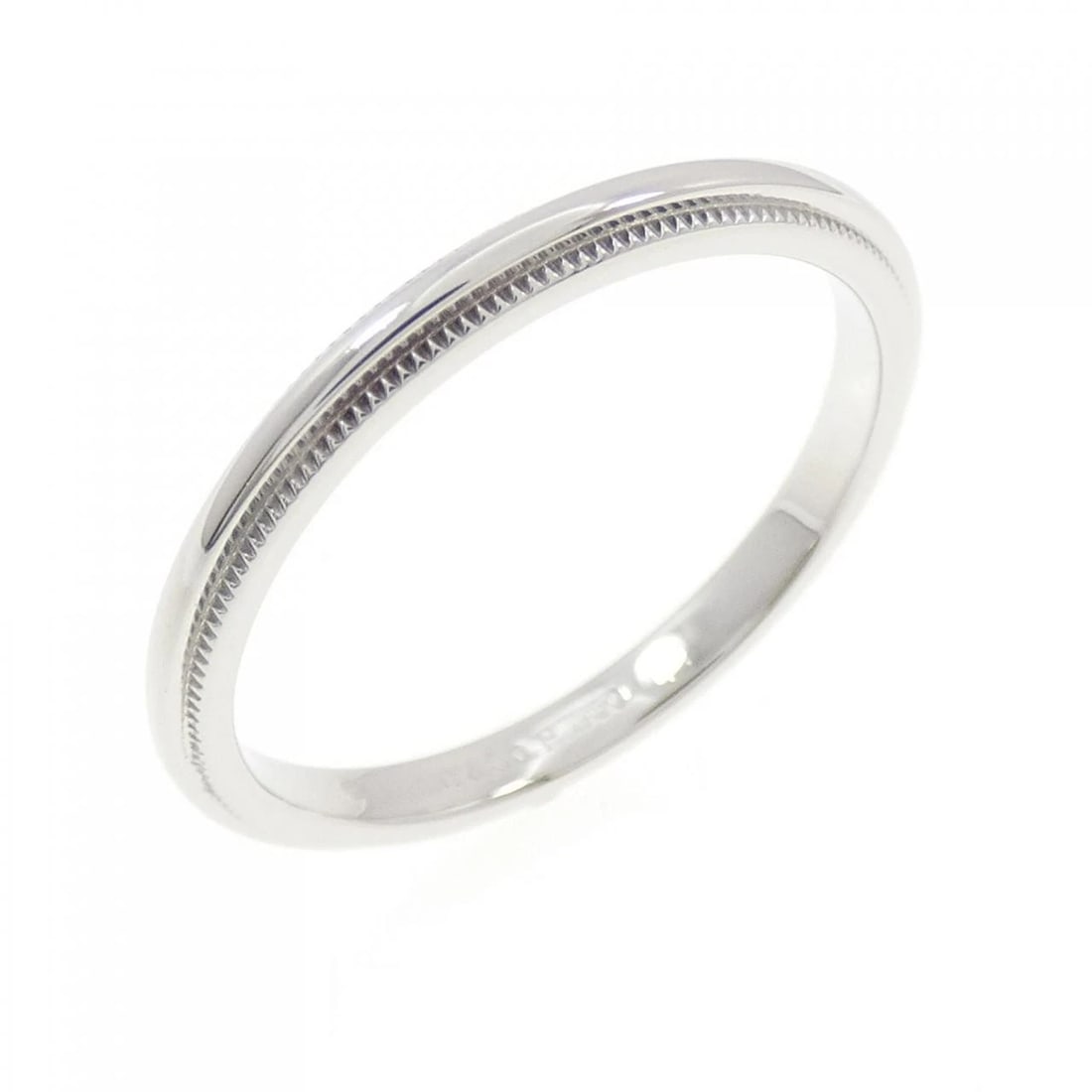 TIFFANY & CO. MILGRAIN RING: Tiffany & Co. Milgrain Ring Brand: Tiffany Type: Ring Material: Platinum 950, Color: White Size: 7.5 (US size) Accessories: None Accessories Notice: When purchasing pre-owned goods, please