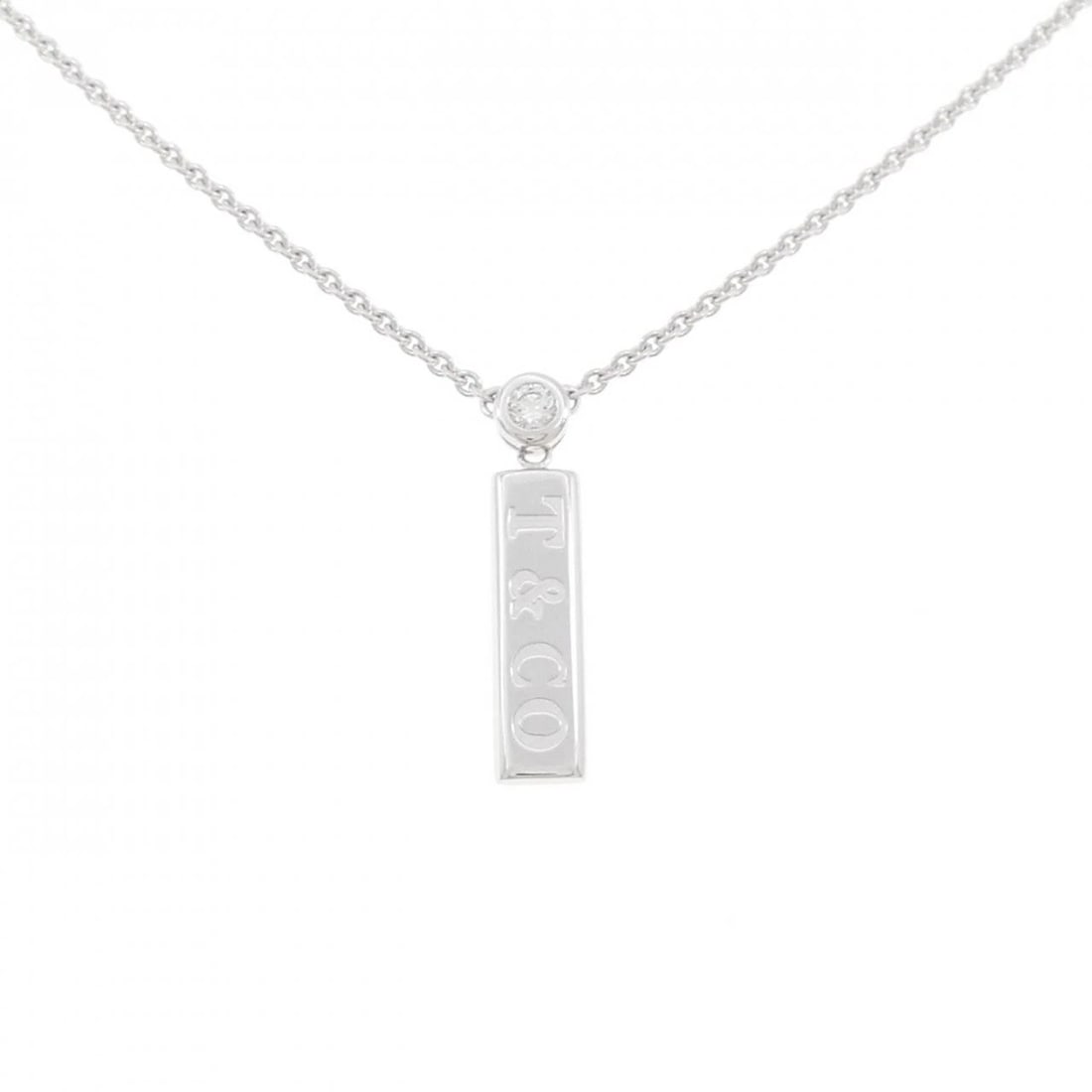 TIFFANY BAR DROP NECKLACE: Tiffany Bar Drop Necklace Brand: Tiffany Type: Necklace Material: 750 White Gold, Main Stone/Creation Natural Color: White Gold Size: ActualSize Pendant top H x W: 22.2mmx4.8mm Chain Max. W: 1.4mm