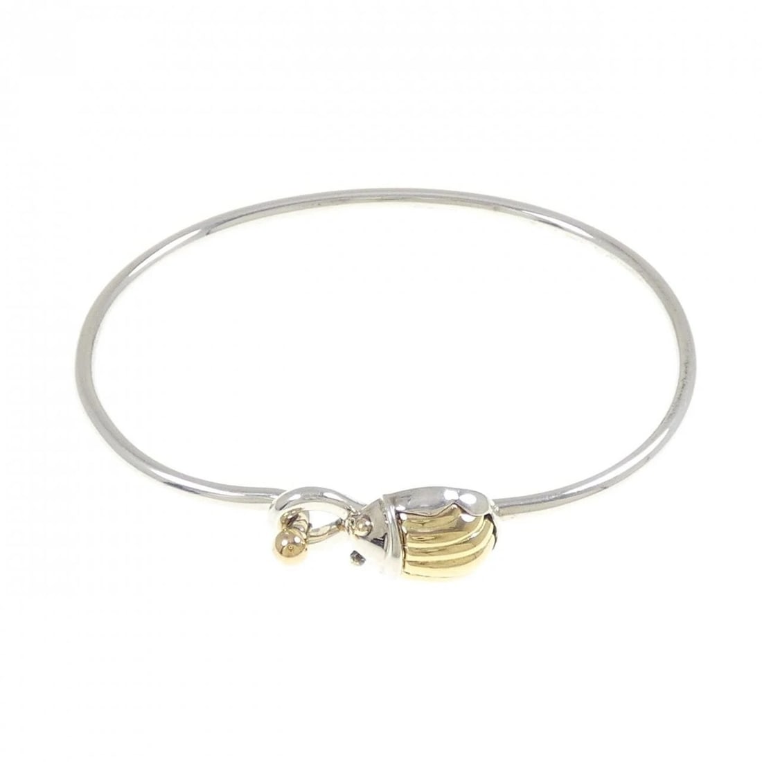 TIFFANY & CO. 925 750YG BANGLE: Tiffany & Co. 925 750YG Bangle Brand: Tiffany Type: Bracelet Material: 925 Silver 750 Yellow Gold, Color: Silver Yellow Gold" Size: 18cmActualSize Max W: 11.9mm Accessories: None Accessories
