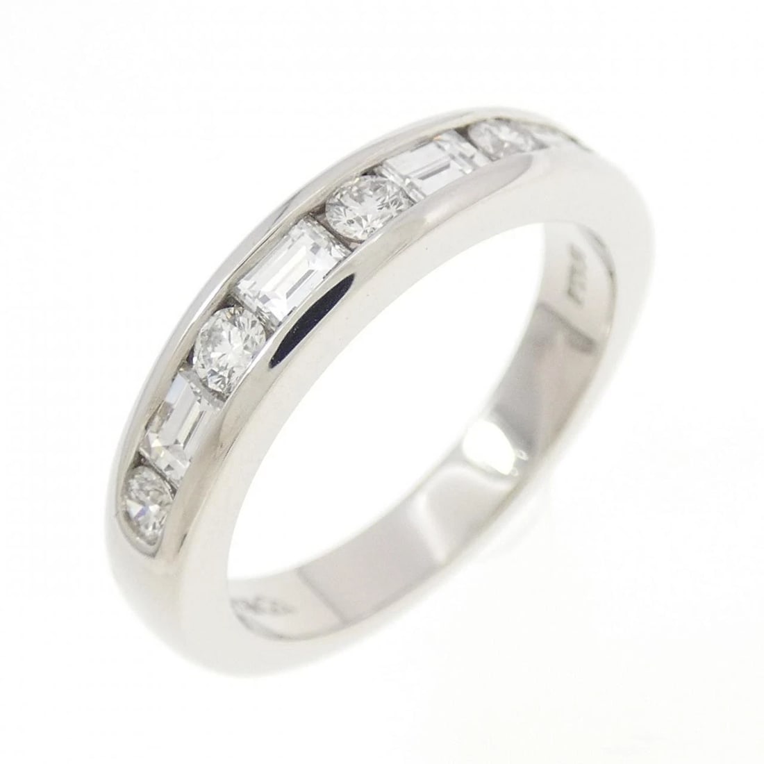 TIFFANY CHANNEL SETTING RING: Tiffany Channel Setting Ring Brand: Tiffany Type: Ring Material: Platinum 950, Main Stone/Creation Natural Color: White Size: 4.5 (US size) Accessories: None Accessories Notice: When