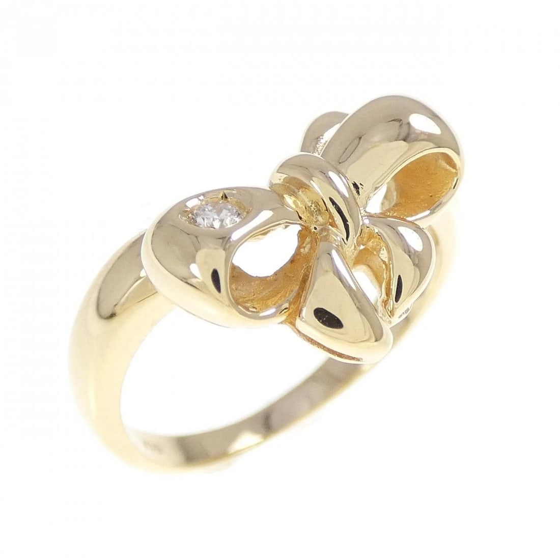 K18YG RIBBON DIAMOND RING: K18YG Ribbon Diamond Ring Brand: Unbranded Type: Ring Material: K18 Yellow Gold, Main Stone/Creation Natural Color: Yellow Gold Size: 5-5.5 US Accessories: None Accessories Notice: When