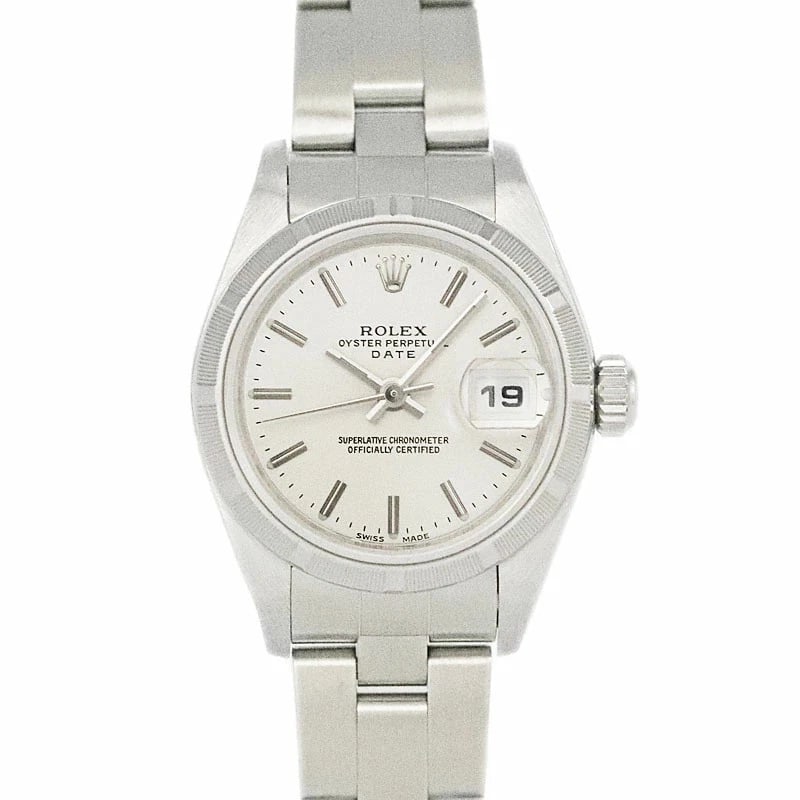 ROLEX OYSTER PERPETUAL SILVER WATCH: ROLEX Oyster Perpetual silver Watch Brand: ROLEX Type: N/A Material: Band Material Ss/Stainless Steel, Case Material N/A Color: Band Color Silver Size: Band Size none, Case Size 26.0mm 