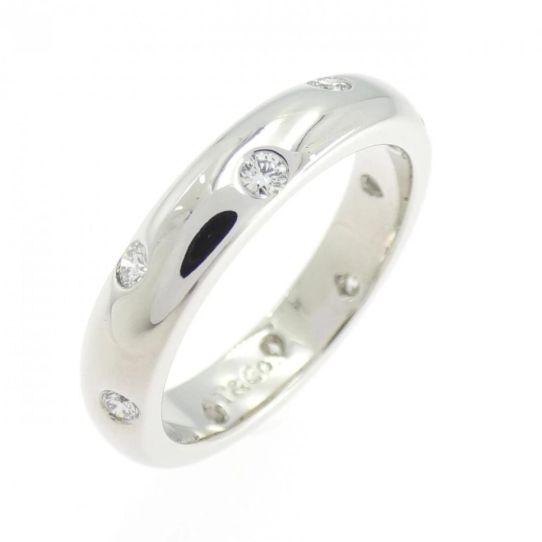 TIFFANY & CO. DOTS RING: Tiffany & Co. Dots Ring Brand: Tiffany Type: Ring Material: Platinum 950, Main Stone/Creation Natural Color: white Size: 5 (US size) Accessories: None Accessories Notice: When purchasing