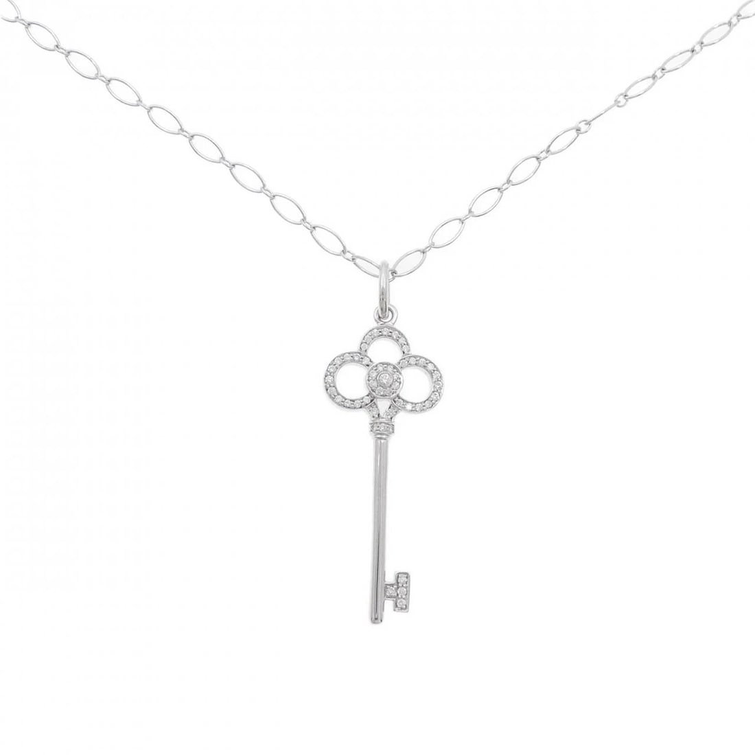 TIFFANY CROWN KEY NECKLACE: Tiffany Crown Key Necklace Brand: Tiffany Type: Necklace Material: 750 White Gold, Main Stone/Creation Natural Color: White Gold Size: ActualSize Pendant top H x W: 41.1mmx13.7mm Chain Max. W: