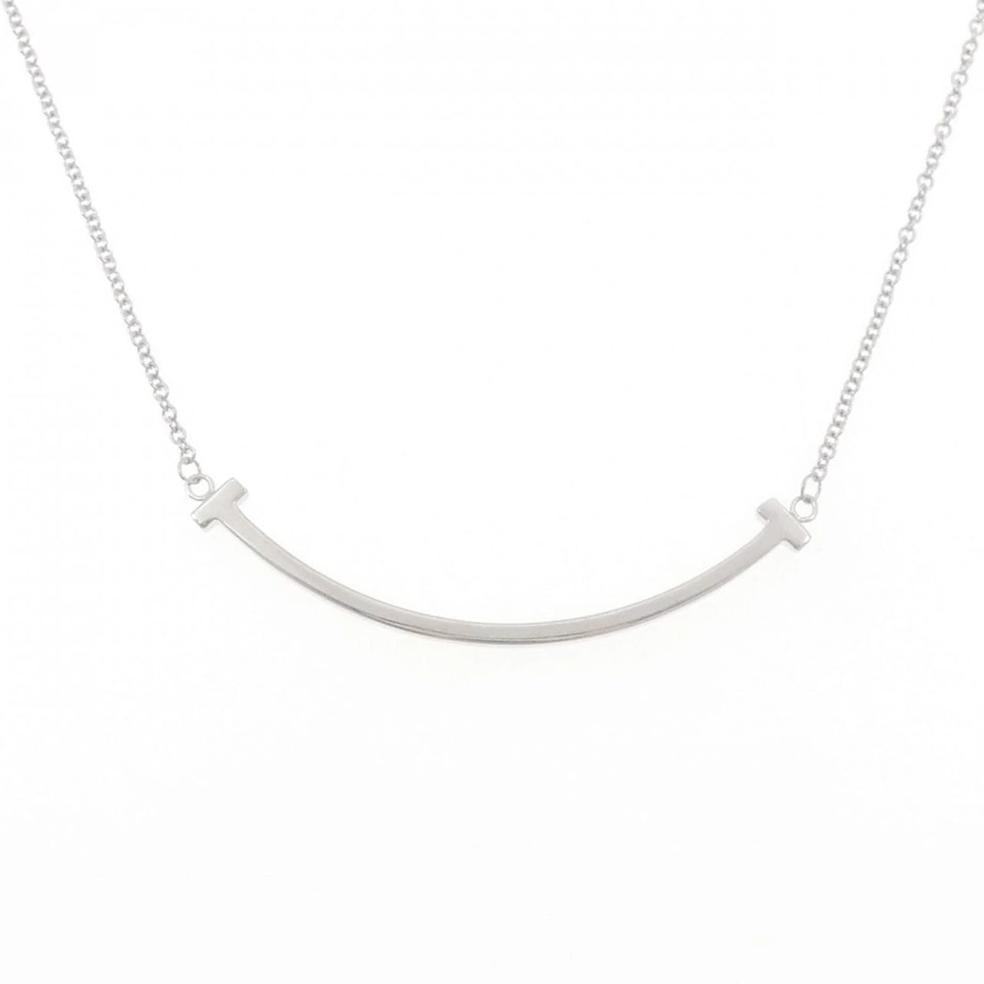 TIFFANY&CO. T SMILE SMALL NECKLACE: TIFFANY&Co. T Smile Small Necklace Brand: TIFFANY&Co. Type: Necklace Material: 750 white gold, Color: White Size: 41?46cmActual Size Pendant length approx. x width approx.: 3.5mmx36.9mm Chain