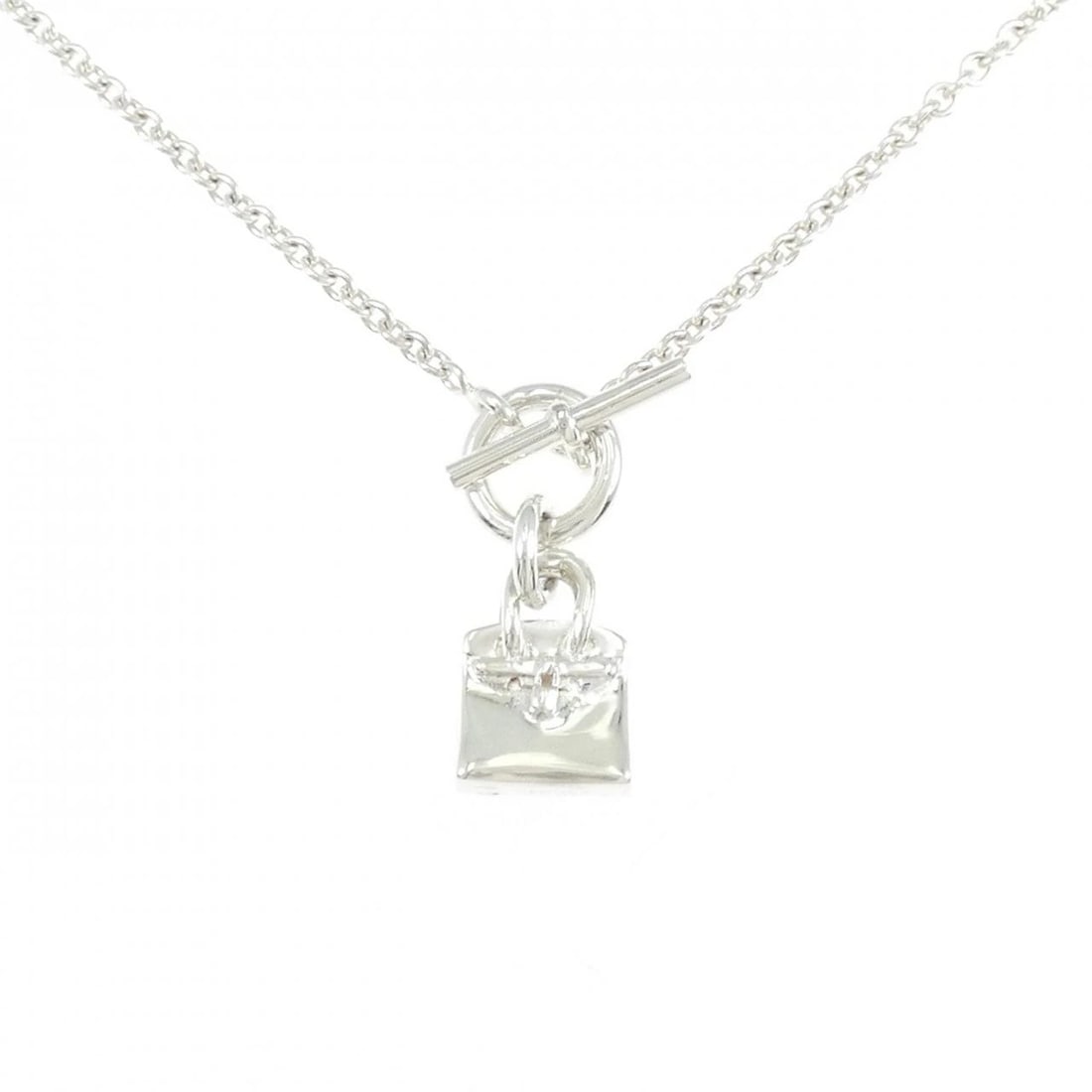 HERMES AMULET BIRKIN NECKLACE: HERMES Amulet Birkin Necklace Brand: HERMES Type: Necklace Material: 925 Silver, Color: Silver Size: ActualSize Pendant top H x W: 27.6mmx11.5mm Chain Max. W: 2.4mm Size40cm Accessories: None