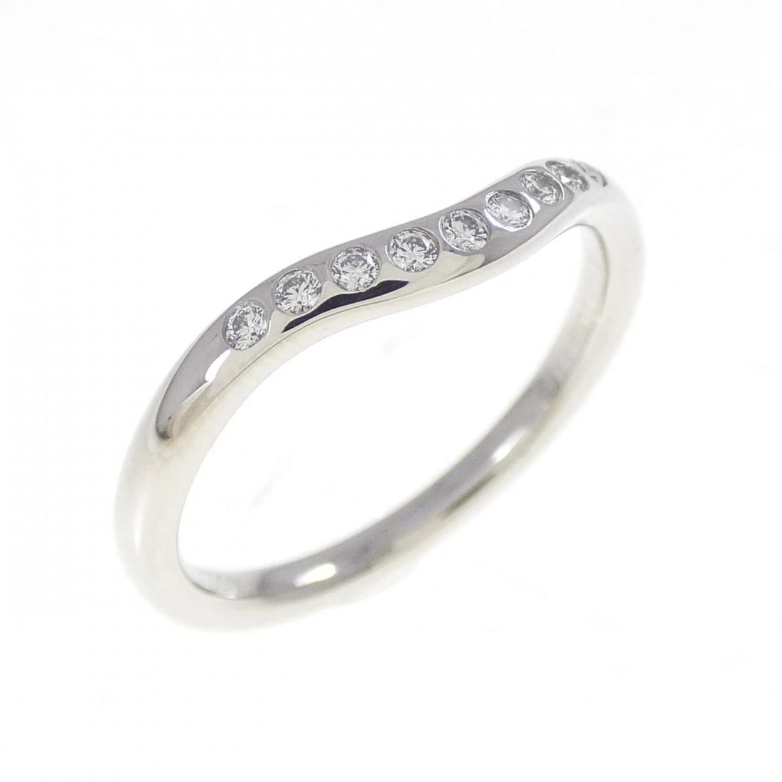 TIFFANY CURVED 9P RING: Tiffany Curved 9P Ring Brand: Tiffany Type: Ring Material: Platinum 950, Main Stone/Creation Natural Color: White Size: 4-4.5 (US size) Accessories: None Accessories Notice: When purchasing