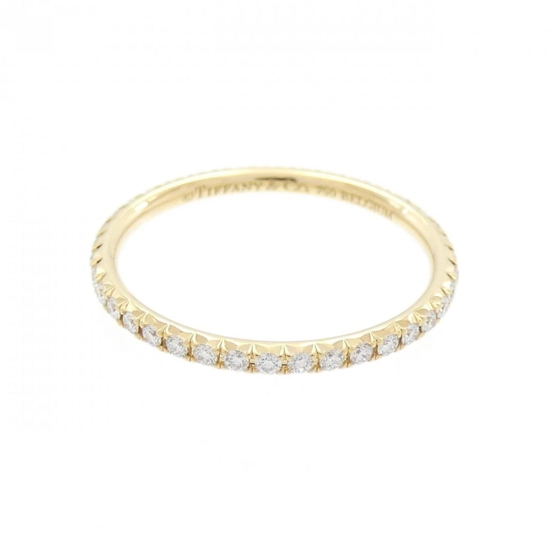 TIFFANY & CO. METRO RING: Tiffany & Co. Metro Ring Brand: Tiffany Type: Ring Material: 750 Yellow Gold, Main Stone/Creation Natural Color: yellow gold Size: 4.5-5 (US size) Accessories: None Accessories Notice: When