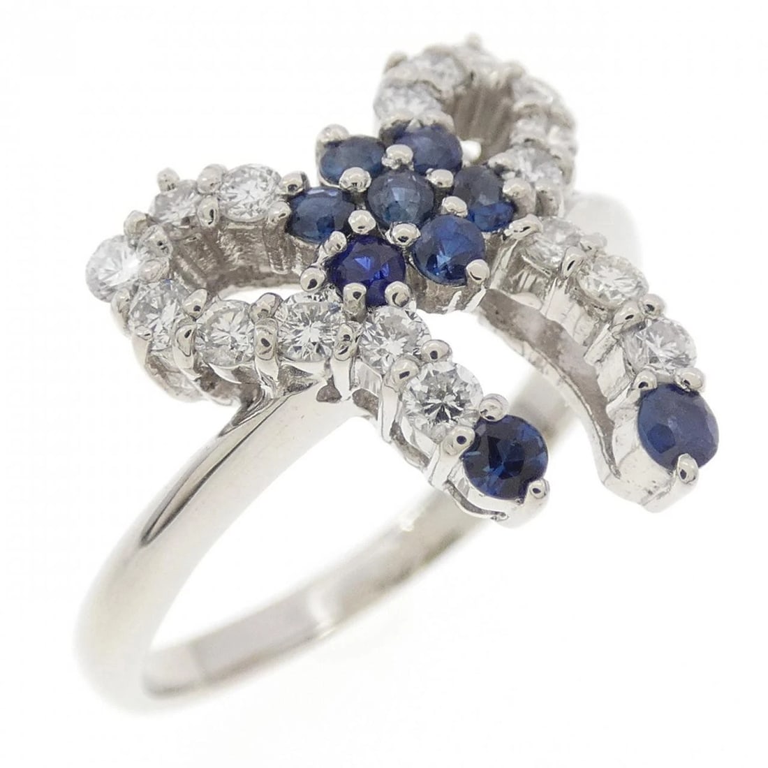 PT900 RIBBON SAPPHIRE RING: PT900 Ribbon Sapphire Ring Brand: Unbranded Type: Ring Material: Platinum 900 Platinum, Main Stone/Creation Sapphire Color: White Gold Size: 5.5 US Accessories: None Accessories Notice: When