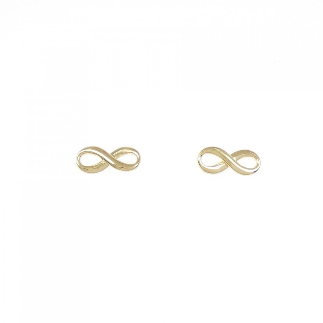 TIFFANY INFINITY EARRINGS: Tiffany Infinity Earrings Brand: Tiffany Type: Earrings Material: 750 Yellow Gold, Color: Yellow Gold Size: ActualSize HxW: 4.7mmx10.8mm Accessories: None Accessories Notice: When purchasing