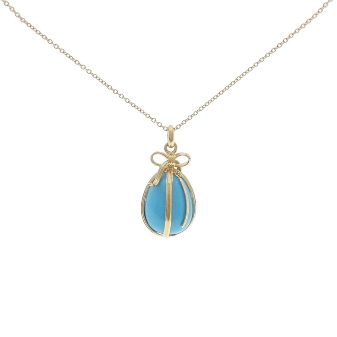 TIFFANY TURQUOISE NECKLACE: Tiffany Turquoise Necklace Brand: Tiffany Type: Necklace Material: 750 Yellow Gold, Main Stone/Creation Turquoise Color: Yellow Gold Size: ActualSize Pendant top H x W: 34.5mmx17.3mm Chain