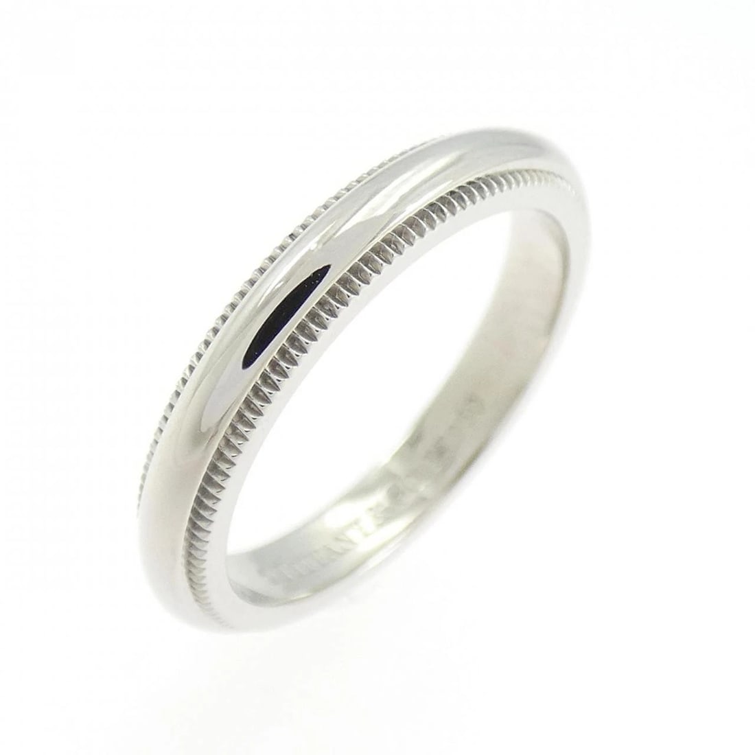 TIFFANY & CO. MILGRAIN RING: Tiffany & Co. Milgrain Ring Brand: Tiffany Type: Ring Material: Platinum 950, Color: White Size: 3.5 (US size) Accessories: None Accessories Notice: When purchasing pre-owned goods, please