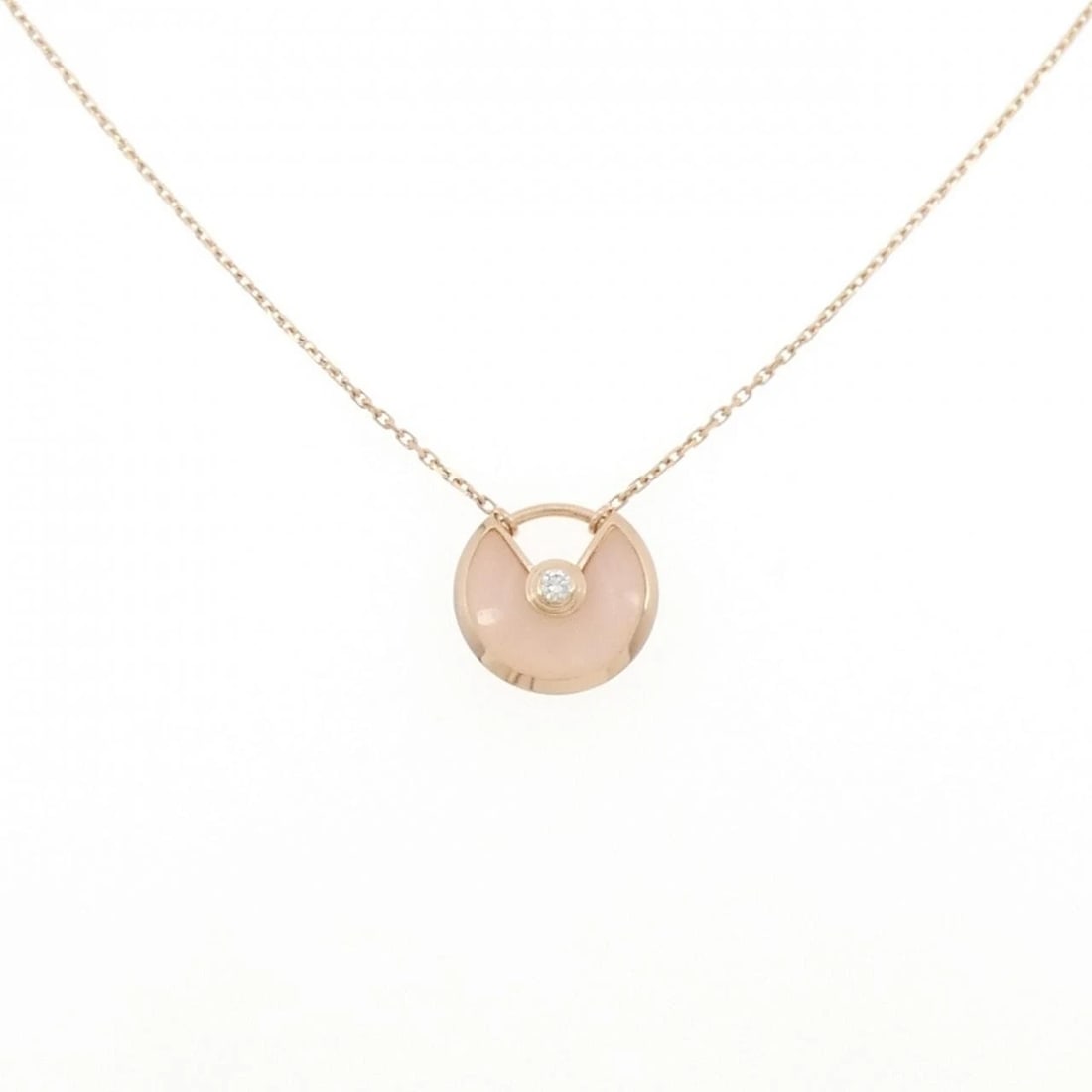 CARTIER AMULET EXTRA SMALL NECKLACE: Cartier Amulet Extra Small Necklace Brand: Cartier Type: Necklace Material: 750 Pink Gold, Main Stone/Creation Opal Color: Pink Gold Size: ActualSize Pendant top H x W: 11.3mmx11.9mm Chain
