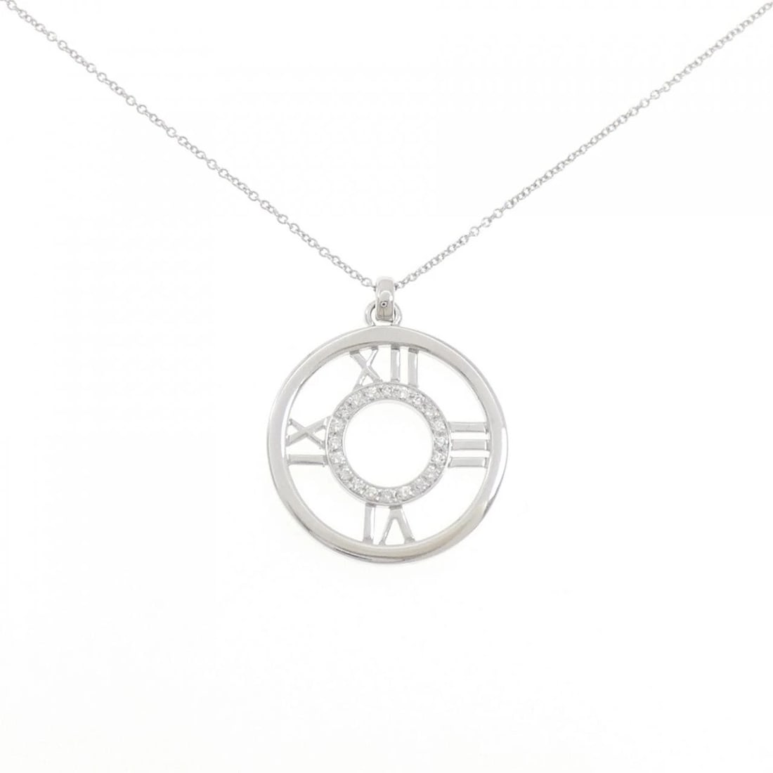 TIFFANY & CO. ATLAS OPEN MEDALLION NECKLACE: Tiffany & Co. Atlas open Medallion Necklace Brand: Tiffany Type: Necklace Material: 750 White Gold, Main Stone/Creation Natural Color: White Gold Size: ActualSize Pendant top H x W: