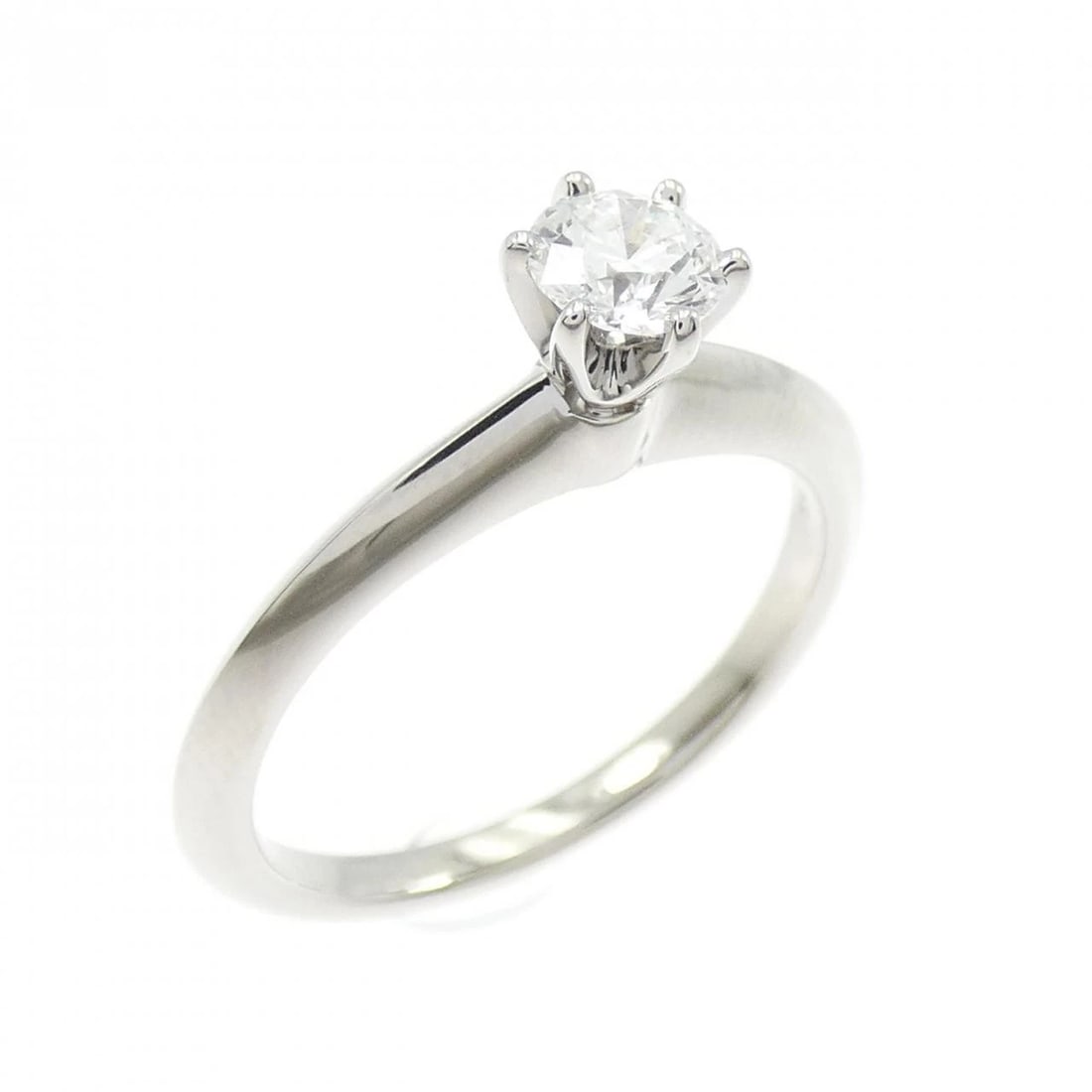 TIFFANY CLASSIC SOLITAIRE RING: Tiffany Classic Solitaire Ring Brand: Tiffany Type: Ring Material: Platinum 950, Main Stone/Creation Natural Color: white Size: 4.5 (US size) Accessories: None Accessories Notice: When pur
