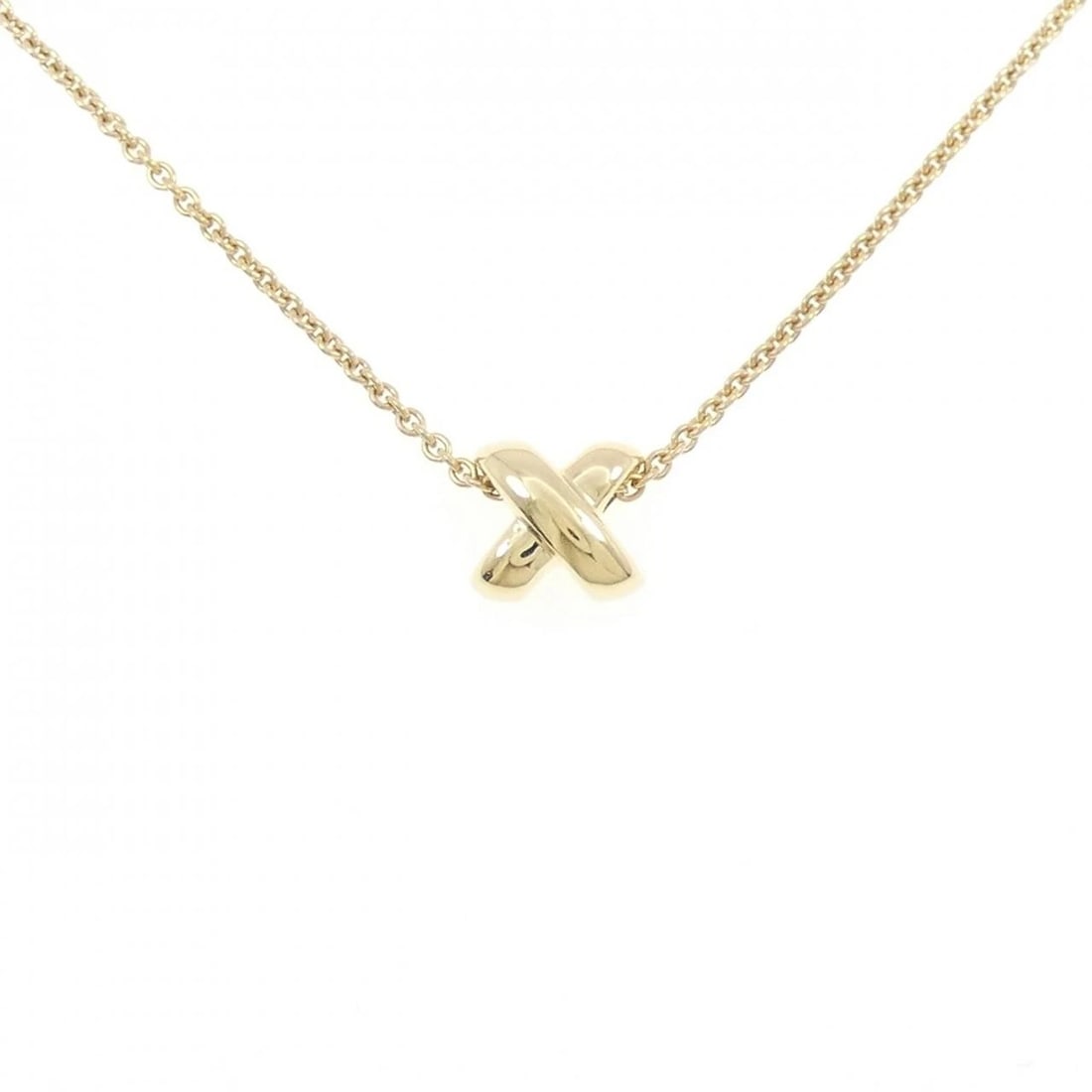 TIFFANY & CO. CROSS STITCH NECKLACE: Tiffany & Co. Cross Stitch Necklace Brand: Tiffany Type: Necklace Material: 750 Yellow Gold, Color: Yellow Gold Size: ActualSize Pendant top H x W: 8.4mmx8.9mm Chain Max. W: 1.4mm 