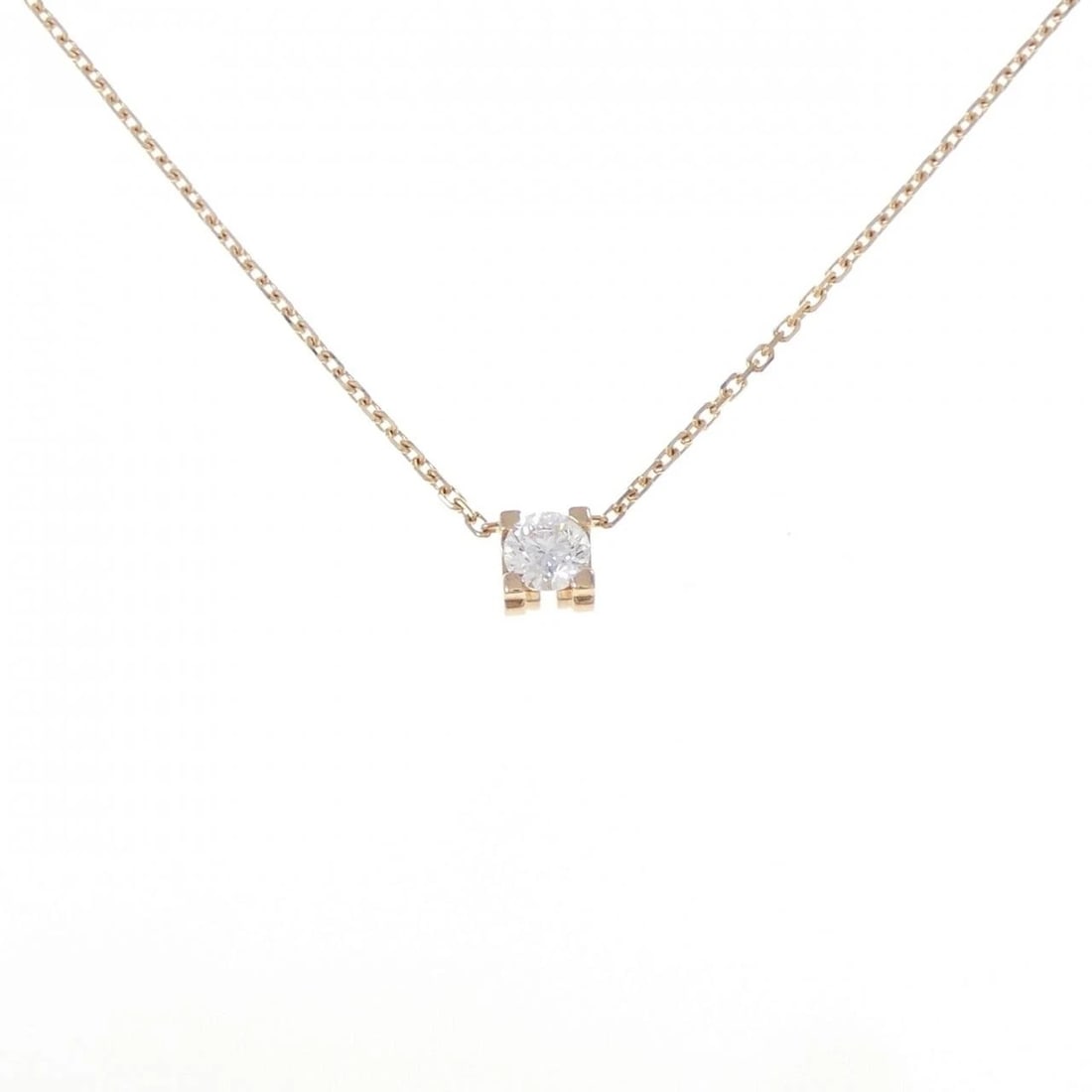 CARTIER C DE CARTIER NECKLACE: Cartier C de Cartier Necklace Brand: Cartier Type: Necklace Material: 750 Pink Gold, Main Stone/Creation Natural Color: Pink Gold Size: ActualSize Pendant top H x W: 4.0mmx4.0mm Chain Max. W: